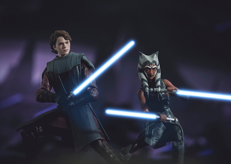 Anakin and his Padawan wield lightsabers