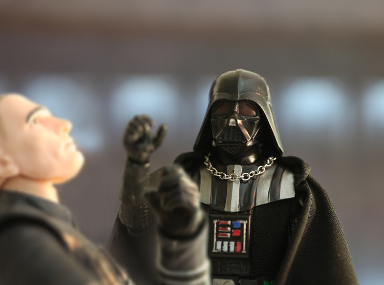 Dart Vader uses force choke with Admiral Motti