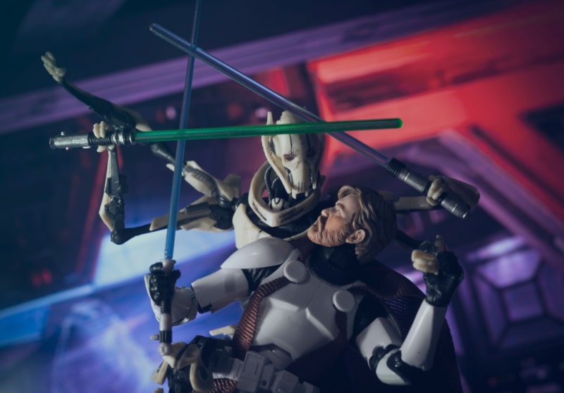Obi Wan Kenobi battling General Grievous with lightsabers