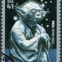 old yoda printed on a stamp