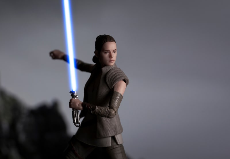 rey with a blue lightsaber
