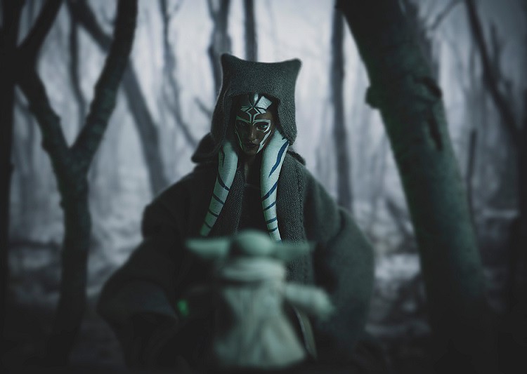 Ahsoka and Baby Yoda in a dark forest
