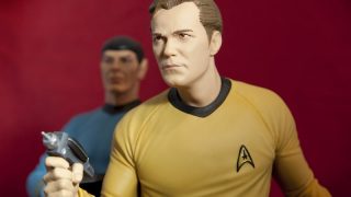 Captain Kirk and Mr Spock with a phaser