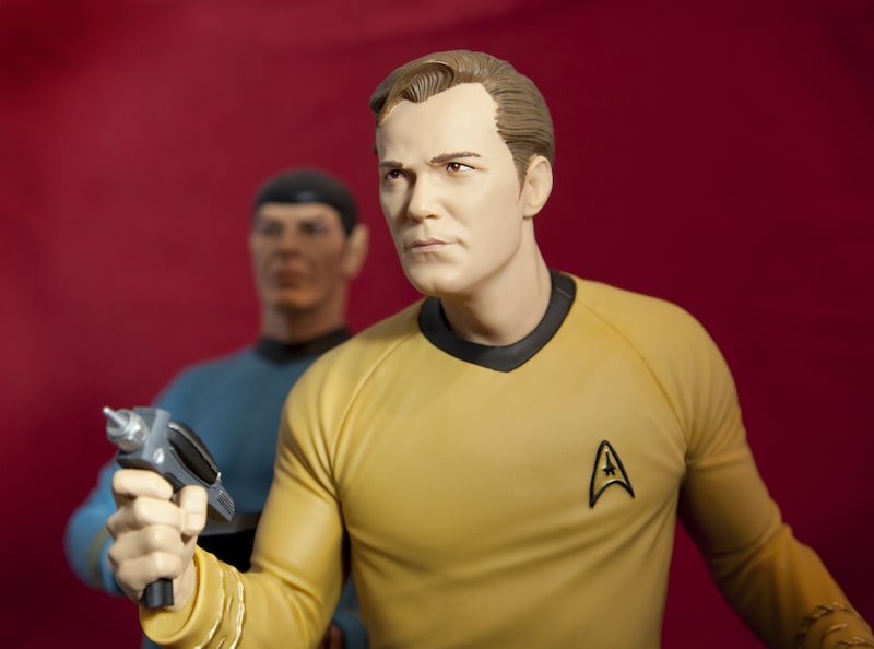 Captain Kirk and Mr Spock with a phaser