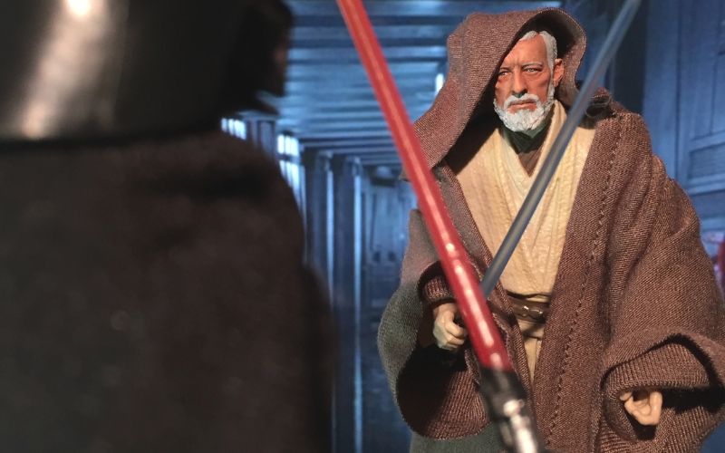 Darth Vader and Obi Wan Kenobi in a climatic duel