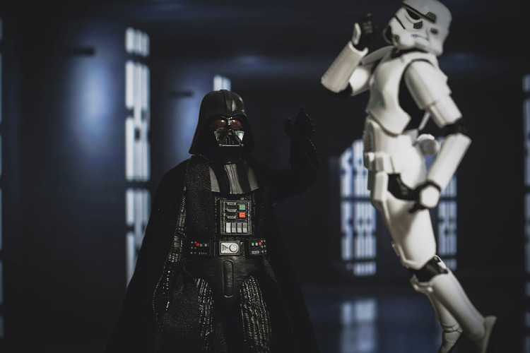 Darth Vader using the force choke with a Stormtrooper