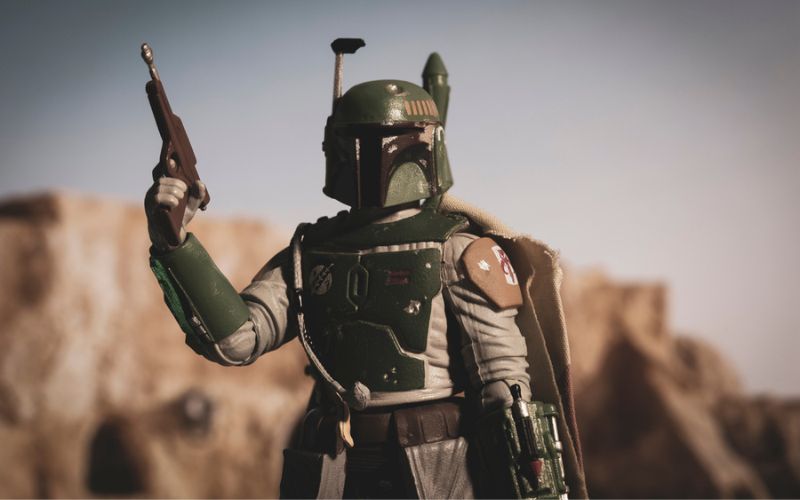 bounty hunter Boba Fett on Tatooine with the blaster in his hand
