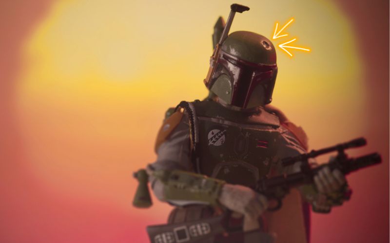 the dent in Boba Fett's helmet