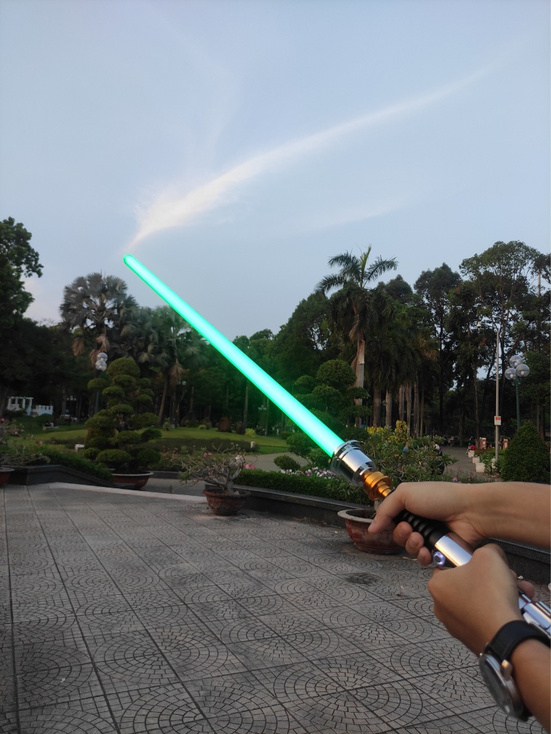 Weilds-the-lightsaber-in-the-air