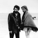 George Lucas in a black-and-white portrait