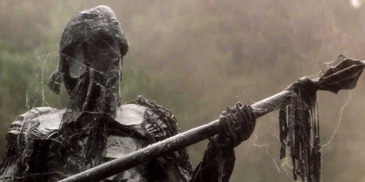 The armored Black Angel holding a weapon in Roger Christian's 1980 short film