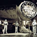 Stormtroopers surrounding the Millennium Falcon inside a Death Star hangar