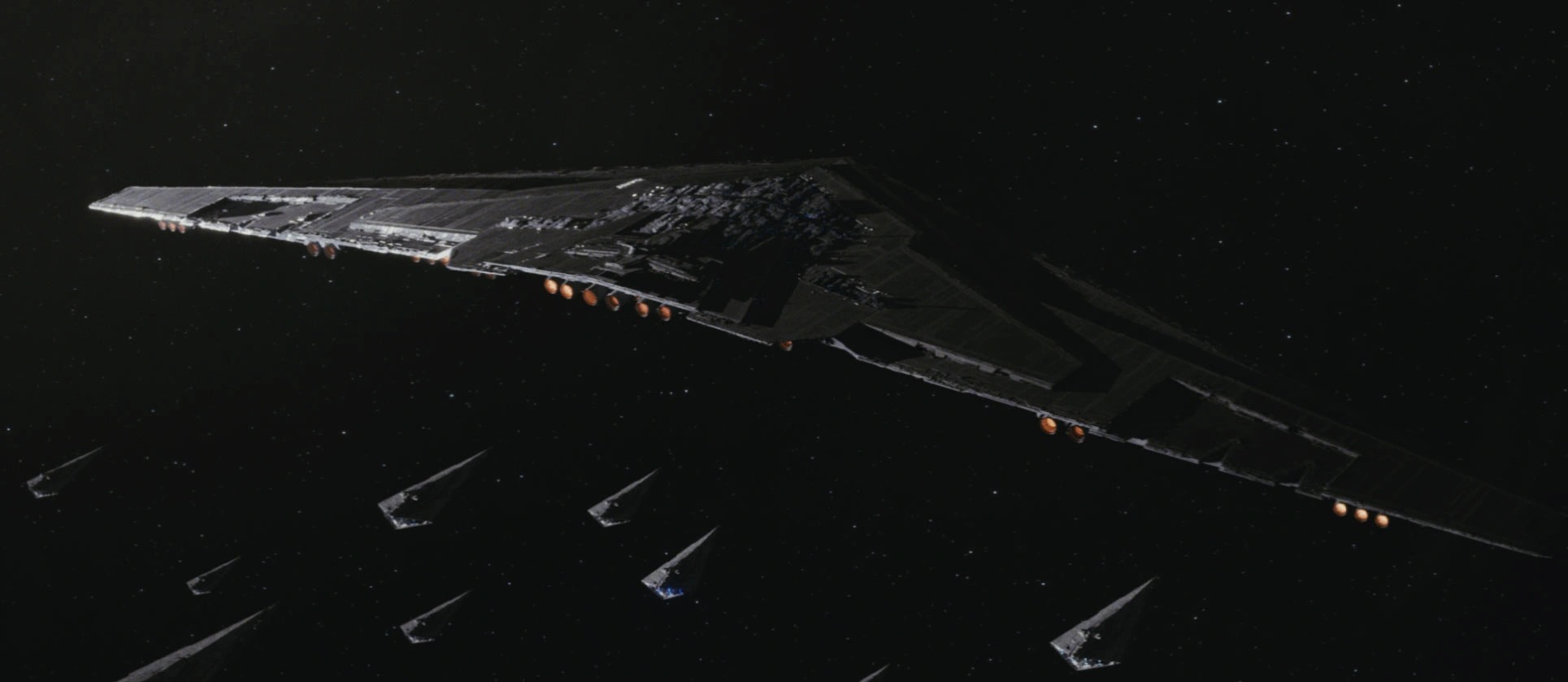 The enormous First Order flagship Supremacy flying with smaller Star Destroyers