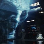 General Hux faces a large hologram of Supreme Leader Snoke in The Last Jedi