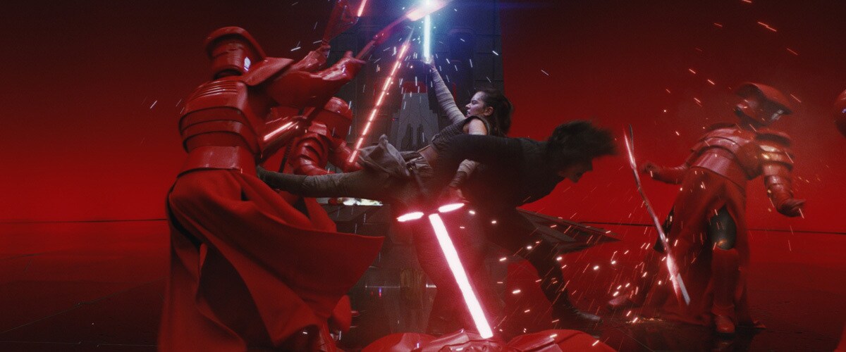 Rey and Kylo Ren fighting Snoke's Praetorian Guards